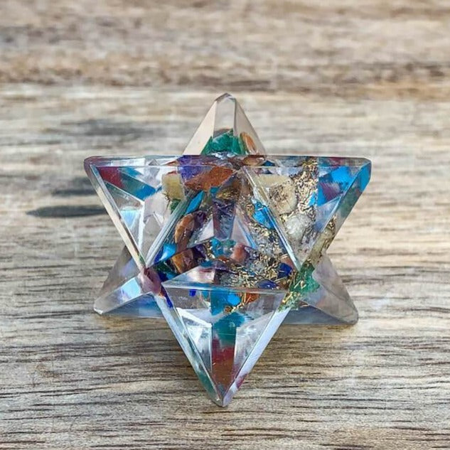 Buy 7 Chakra Orgone Merkaba Star - Crystals with Orgone Energy! Used for orgone Healing Reiki, healing Chakra, Merkaba Orgone Merkaba Star. Orgone Merkaba helps against EMF & haarp radiations in our environment. MagicCrystals.com carries orgonite resin star filled with healing crystal. Sacred Geometry