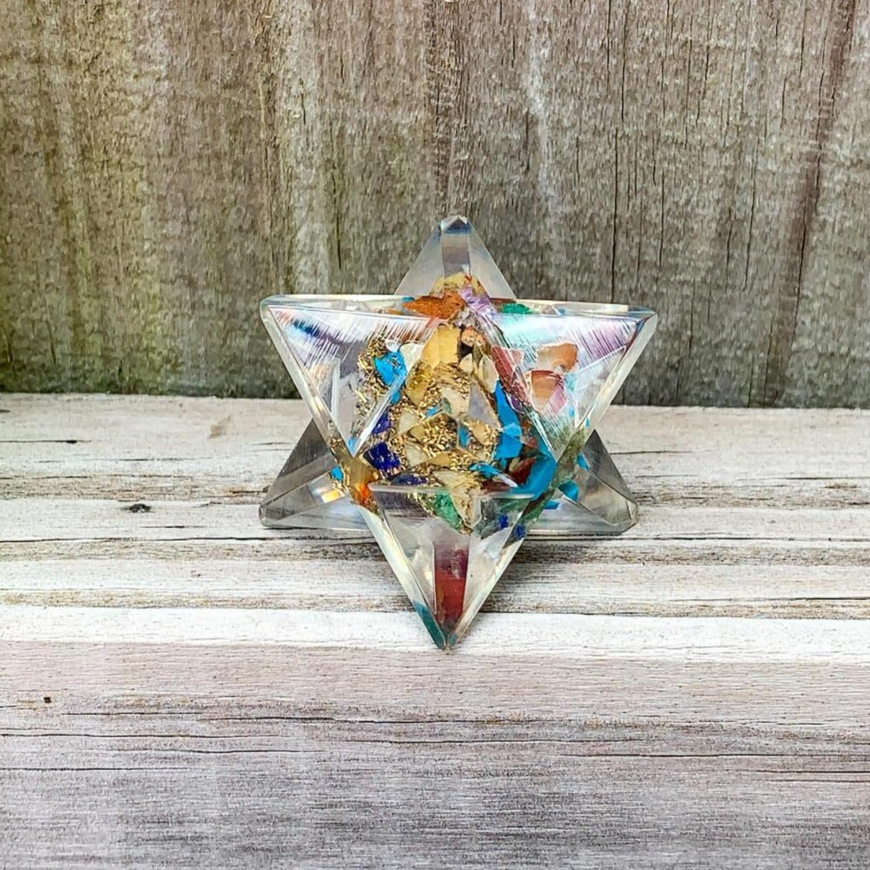 Buy 7 Chakra Orgone Merkaba Star - Crystals with Orgone Energy! Used for orgone Healing Reiki, healing Chakra, Merkaba Orgone Merkaba Star. Orgone Merkaba helps against EMF & haarp radiations in our environment. MagicCrystals.com carries orgonite resin star filled with healing crystal. Sacred Geometry