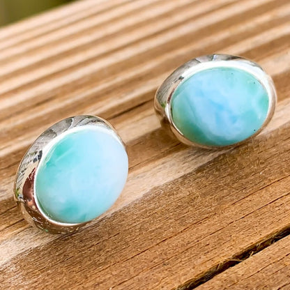 This lovely, rare and spectacular mineral gem called Larimar is a blue pectolite found in the Dominican Republic. Shop Genuine Blue Larimar Earrings set in Sterling Silver at Magic Crystals. We carry Larimar Teardrop Stone, Sterling Caribbean Larimar Earrings, Gift For Her, Gemstone Earrings and Stud earrings.