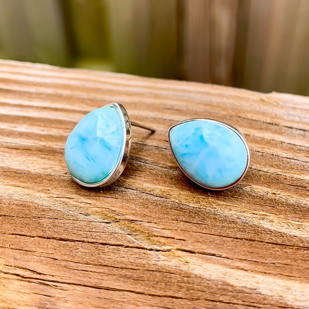 This lovely, rare and spectacular mineral gem called Larimar is a blue pectolite found in the Dominican Republic. Shop Genuine Blue Larimar Earrings set in Sterling Silver at Magic Crystals. We carry Larimar Teardrop Stone, Sterling Caribbean Larimar Earrings, Gift For Her, Gemstone Earrings and Stud earrings.