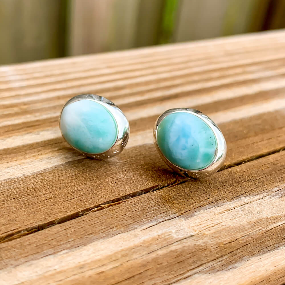 This lovely, rare and spectacular mineral gem called Larimar is a blue pectolite found in the Dominican Republic. Shop Genuine Blue Larimar Earrings set in Sterling Silver at Magic Crystals. We carry Larimar Teardrop Stone, Sterling Caribbean Larimar Earrings, Gift For Her, Gemstone Earrings and Stud earrings.