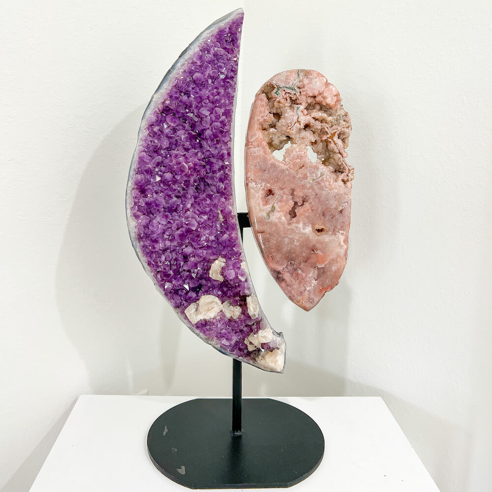 Buy Magic Crystals Gorgeous Druzy Amethyst and Pink Amethyst Slice On a Stand, Purple Amethyst Point, Pink Amethyst Stone Point, Crystal Point, Power Point at Magic Crystals. Natural Amethyst Gemstone for PROTECTION, PEACE, INSPIRATION. This statement piece that will always be the conversation starter in a home.  