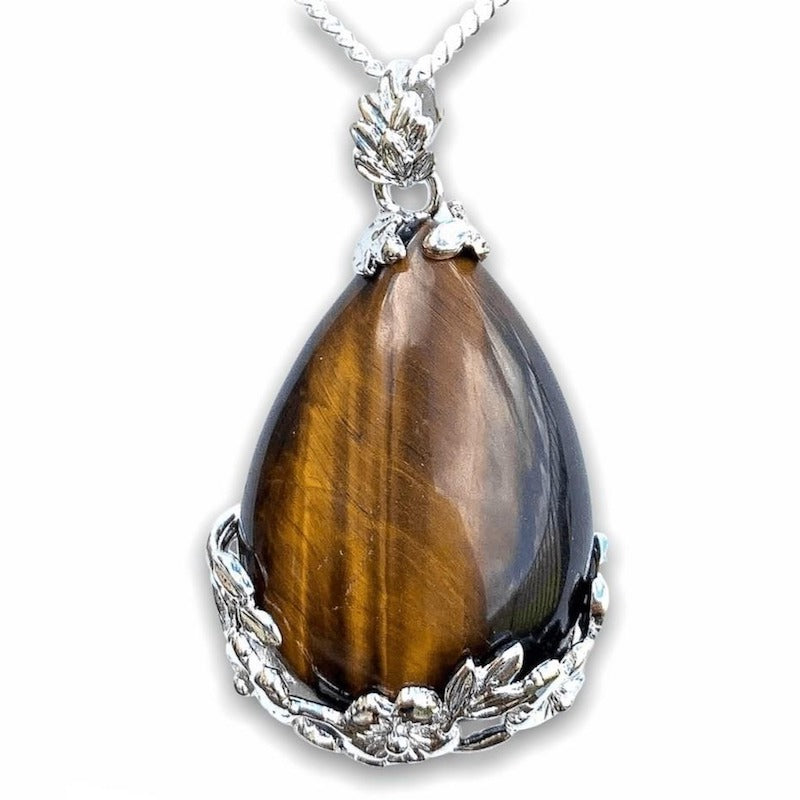 Tiger Eye Stone Pendant Handmade Crystal Necklace from MagicCrystals. High quality yellow tiger eye. Find a wide variety of yellow tiger eye jewelry. Handmade Tiger eye pieces for mother's day, Christmas, halloween, gift.