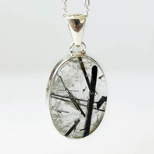 Tourmalinated Quartz Sterling Silver - Quartz Jewelry, a combination of Clear Quartz with Black Tourmaline inclusions. Check out Magic Crystals for the very best selection of tourmalinated quartz. Tourmaline Quartz necklace,EMF Protection,Grounding. pendant quartz tourmaline.Black tourmaline and clear quartz necklace. Tourmalinated-Quartz-SterlingSilver-Pendant -c