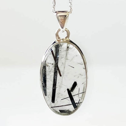 Tourmalinated Quartz Sterling Silver - Quartz Jewelry, a combination of Clear Quartz with Black Tourmaline inclusions. Check out Magic Crystals for the very best selection of tourmalinated quartz. Tourmaline Quartz necklace,EMF Protection,Grounding. pendant quartz tourmaline.Black tourmaline and clear quartz necklace. Tourmalinated-Quartz-SterlingSilver-Pendant - H