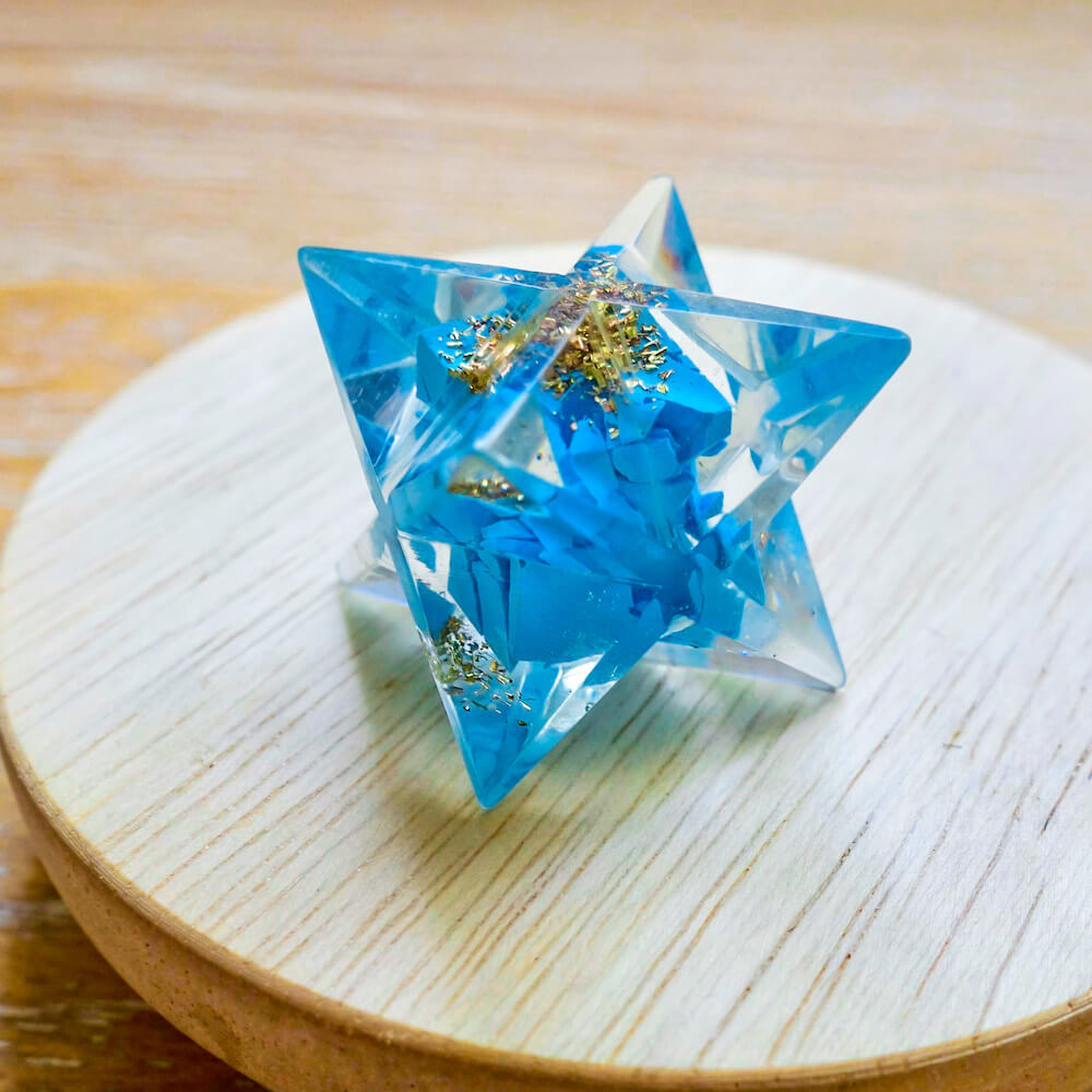 Looking for Blue Turquoise Orgone Merkaba Resin Star, Orgone Star? Shop at Magic Crystals for Blue Turquoise Orgone Merkaba Resin Star, Orgone Star. Turquoise is great for working with the Throat Chakra, to foster honest and clear communication from the heart, and with Water and Air Elements. FREE SHIPPING available