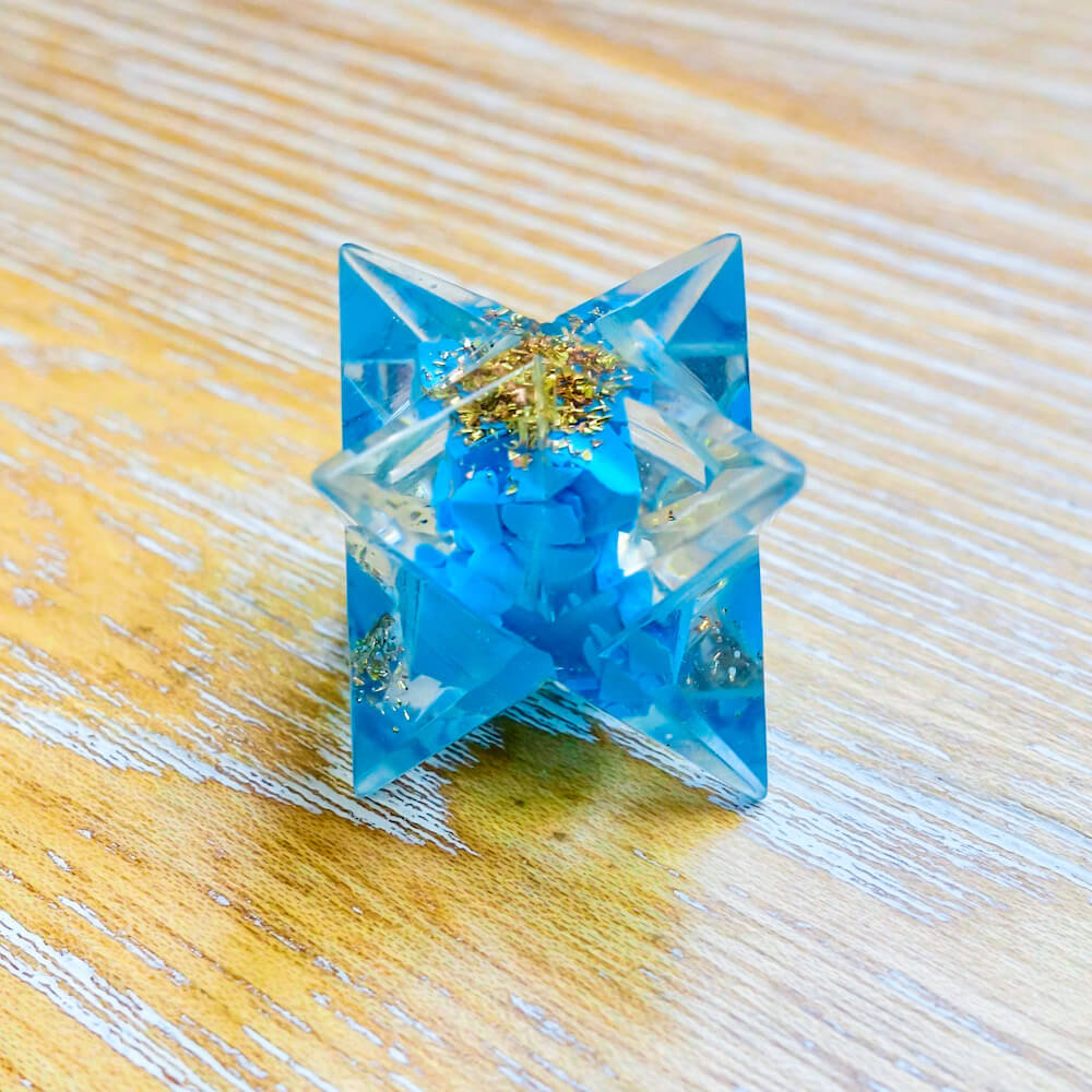 Looking for Blue Turquoise Orgone Merkaba Resin Star, Orgone Star? Shop at Magic Crystals for Blue Turquoise Orgone Merkaba Resin Star, Orgone Star. Turquoise is great for working with the Throat Chakra, to foster honest and clear communication from the heart, and with Water and Air Elements. FREE SHIPPING available