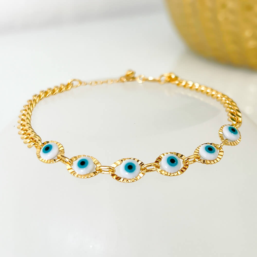 18K Gold Filled Light Blue Evil Eye Protection Bracelet.  Hypoallergenic (lead-free, nickel-free, cadmium-free). MagicCrystals.Com bracelets are hand-crafted with love.  Unique gift with meaning to your precious days such as graduations, birthdays, mother's days, wedding events