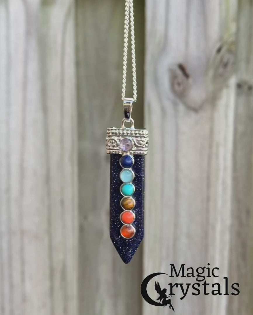 Blue-goldstone-seven-chakras-necklace.ooking for Chakra Jewelry? Shop for 7 Chakra Single Point Pendant Necklace at Magic Crystals. This pendant features seven stones that connect with the seven chakras all aligned atop a crystal point. chakra necklace, 7 chakra stones, yoga necklace with crystal gemstones. handmade crystals, gifts for her, gifts for him