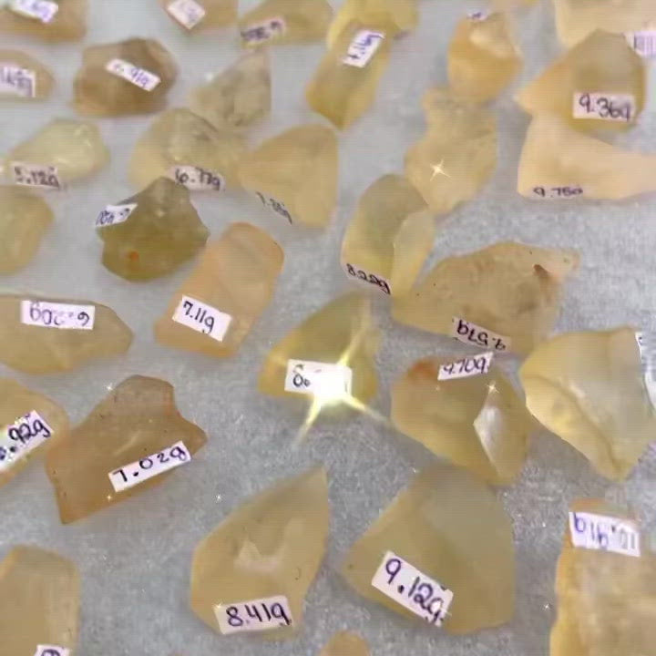 Looking for authentic real Libyan Desert Glass? Shop at Magic Crystals for Lybian Tektite unique pieces by the gram. Yellow and gold tektite from Libya and Egypt. FREE SHIPPING available. Libyan Desert Glass will range between 5-30 mm depending on weight. Rare Tektite at MagicCrystals.com