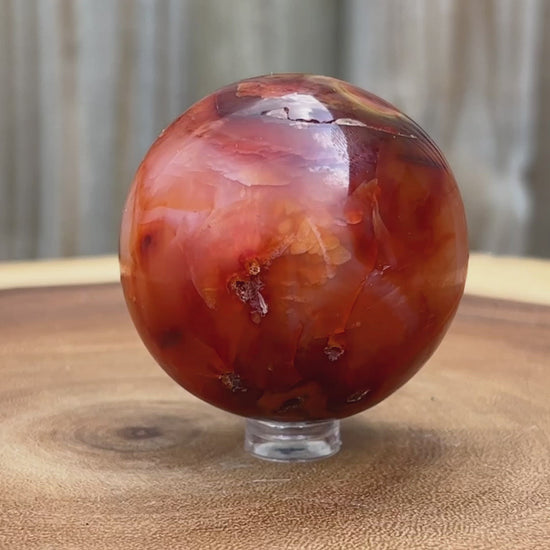 Looking for genuine and stunning Carnelian Crystal Sphere? Shop at Magic Crystals for polished cut base carnelian. We only carry 'AAA' Quality Carnelian from India and Madagascar. Red Agate Crystal Tower for reiki Healing. Free Standing Crystal, Beautiful Display Crystal with FREE SHIPPING AVAILABLE.