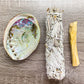 Looking for, where can I buy White Sage, Palo Santo sticks, and abalone shell? Shop at Magic Crystals for White Sage Smudge Kit Mini w/ Detailed Instructions, Abalone Shell (add Palo Santo, Feather, Healing Crystals) Sage Smudge Cleansing Kit at Magic Crystals.