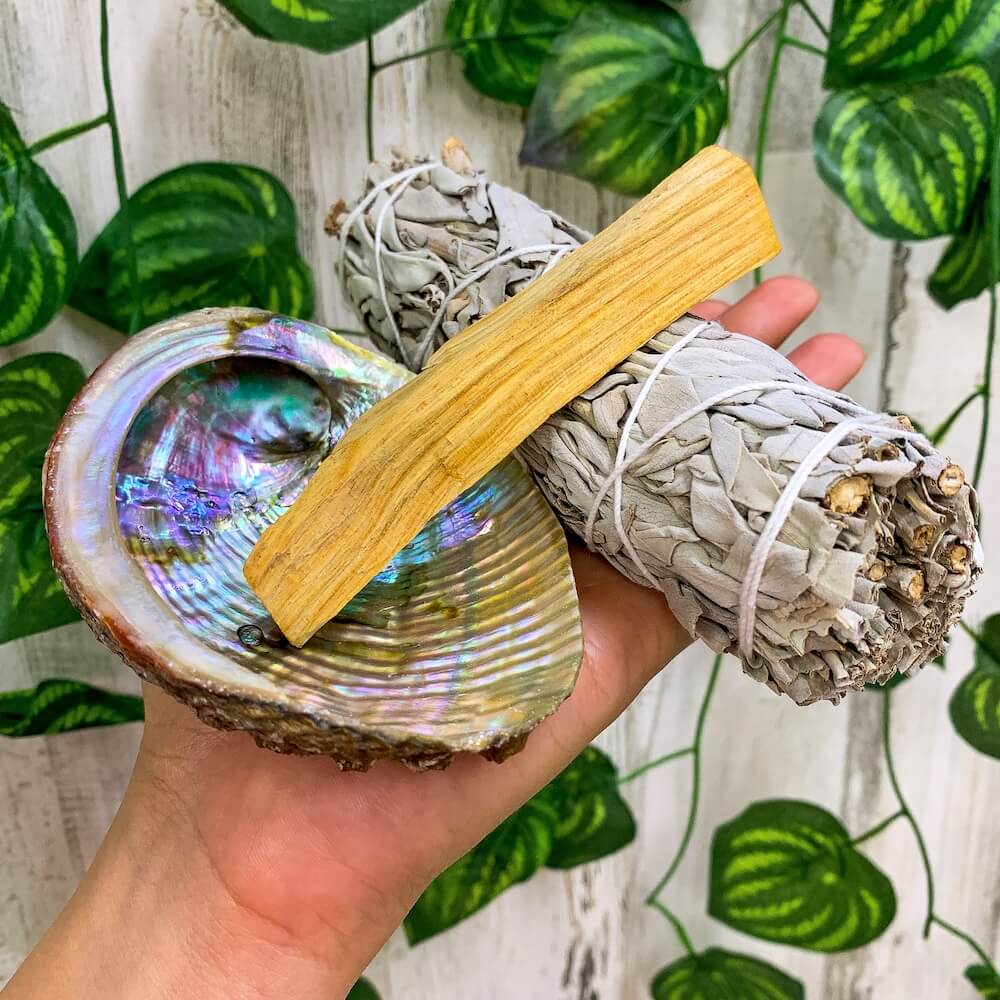 Looking for, where can I buy White Sage, Palo Santo sticks, and abalone shell? Shop at Magic Crystals for White Sage Smudge Kit Mini w/ Detailed Instructions, Abalone Shell (add Palo Santo, Feather, Healing Crystals) Sage Smudge Cleansing Kit at Magic Crystals.