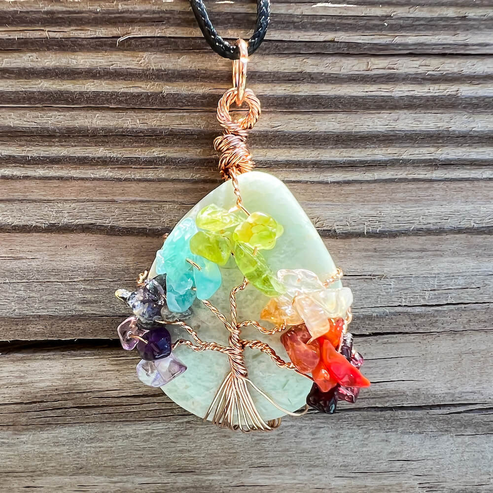 Amazonite-Tree-Of-Life-Chakra-Necklace. Looking for a gift for mother/her, tree of life necklace, stone necklace, pendant? Shop at Magic Crystals for a 7 Chakra Tree Of Life Drop Necklace. 7 Chakra necklaces, and seven chakras jewelry pieces. Handmade Natural Amethyst Crystal. Amethyst Drop shape, teardrop, Protection Necklaces. 