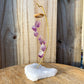 This beautiful 7 crystal point desk chime is made with genuine amethyst crystals draping from a wooden ring. Amethyst Points Desk Chime - Amethyst Home Decor at Magic Crystals with FREE SHIPPING available. perfect for office decor, crystal wind chime, crystal decor. Chime Mobile, Wind Catcher, Spiritual Art.