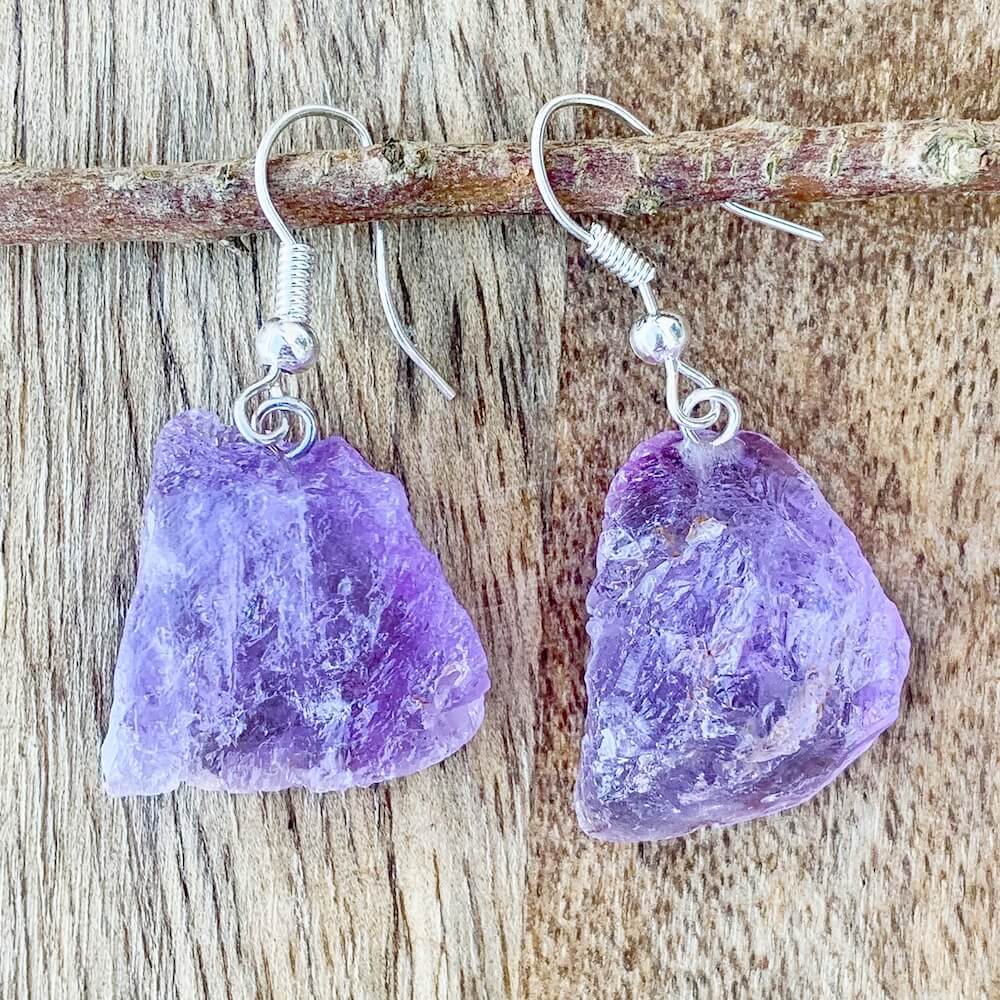 Shop for beautiful Natural Raw Amethyst Dangling Earrings - Raw Amethyst crystal Jewelry at Magiccrystals.com . Magic Crystals have an excellent choice for women. available with FREE SHIPPING and in gold. Find an Amethyst Earring or Genuine Amethyst Earring when you shop at Magic Crystals. February birthstone. 