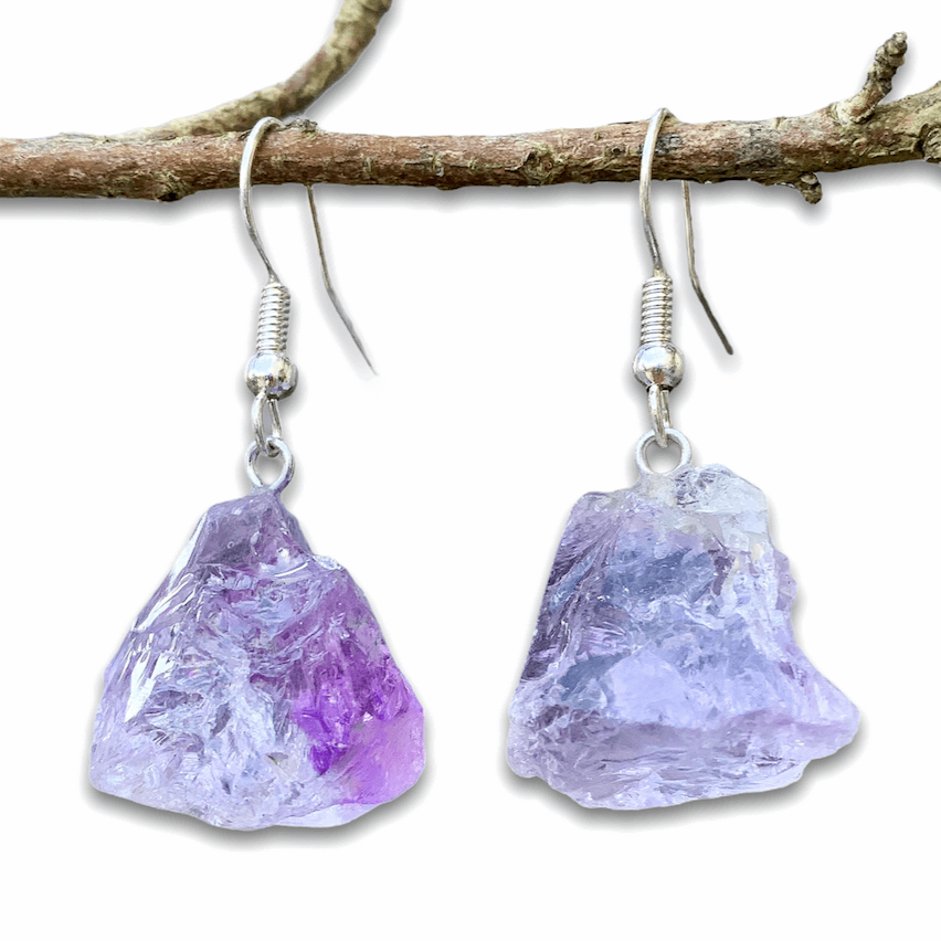 Shop for beautiful Natural Raw Amethyst Dangling Earrings - Raw Amethyst crystal Jewelry at Magiccrystals.com . Magic Crystals have an excellent choice for women. available with FREE SHIPPING and in gold. Find an Amethyst Earring or Genuine Amethyst Earring when you shop at Magic Crystals. February birthstone. 