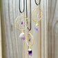 Gorgeous gold plated Amethyst Dreamcatcher gold Necklace adorned with an Amethyst crystal bead and a raw Amethyst crystal hanging from the bottom. Shop at Magic Crystals for Amethyst Jewelry, Healing Crystals, and Stones. Perfect gift for someone or to wear every day. Boho Jewelry, February Birthstone.