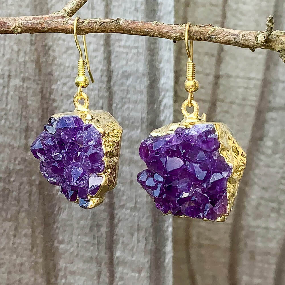 Shop for beautiful Natural Raw Amethyst Dangling Earrings, Golden Druzy Amethyst at magic crystals. magiccrystals.com offer excellent choice for women. available with FREE SHIPPING and in gold. Find a Gold Amethyst Earring or Gold Amethyst Earring when you shop at Magic Crystals. February birthstone.