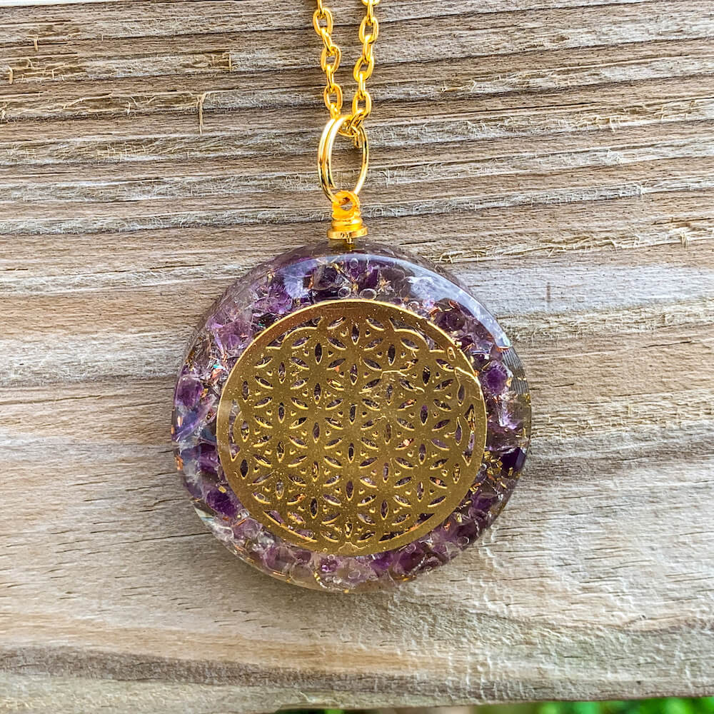 Amethyst Orgone Necklace, Sacred Geometry Orgone for Reiki Healing and Crystal Healing Stones. Amethyst Orgone helps against EMF and haarp radiations in our environment. Sacred light within this Orgonite Resin.  Magic Crystals carries filled with healing crystals.
