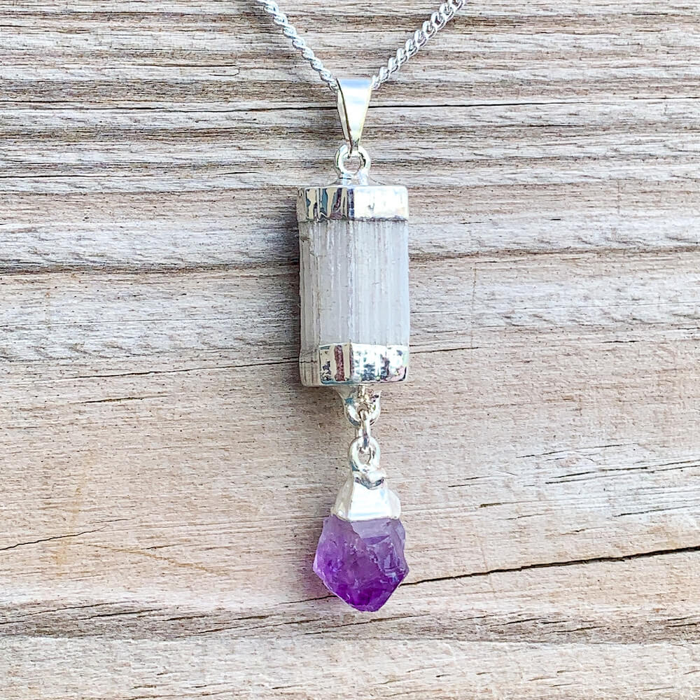 Looking for a Selenite Necklace or Amethyst Necklace? Raw Selenite Pendant with Amethyst, Amethyst, or Quartz crystal point are available at Magic crystals. We carry genuine Selenite, Amethyst stones. FREE SHIPPING available. Selenite necklace - selenite crystal - healing crystals and stones.