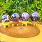 These amethyst Amethyst Sphere - Amethyst Ball - Amethyst Specimen hold a power all their own as they symbolize the ancient sphere found in Egypt. Shop large Amethyst Sphere. Amethyst Crystal Ball and Sphere are extremely powerful and protective stone with a high spiritual vibration, it is also a natural tranquilizer. Amethyst-Sphere