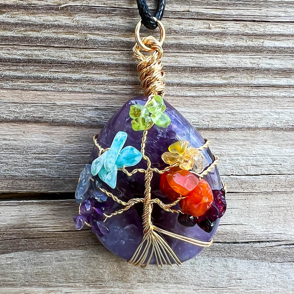 Looking for a gift for mother/her, tree of life necklace, stone necklace, pendant? Shop at Magic Crystals for an Amethyst 7 Chakra Tree Of Life Drop Necklace. 7 Chakra necklaces, and seven chakras jewelry pieces. Handmade Natural Amethyst Crystal. Amethyst Drop shape, teardrop, Protection Necklaces. Collar de Amatista.