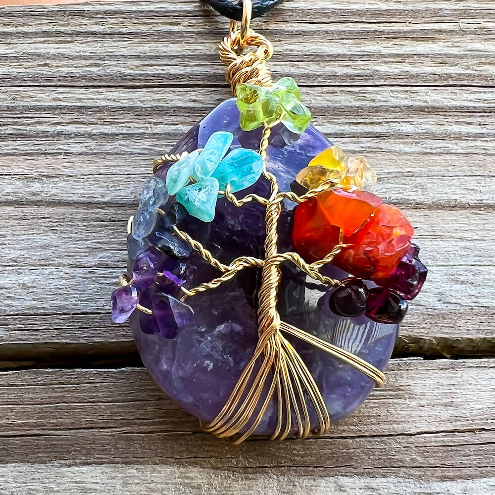 Looking for a gift for mother/her, tree of life necklace, stone necklace, pendant? Shop at Magic Crystals for an Amethyst 7 Chakra Tree Of Life Drop Necklace. 7 Chakra necklaces, and seven chakras jewelry pieces. Handmade Natural Amethyst Crystal. Amethyst Drop shape, teardrop, Protection Necklaces. Collar de Amatista.