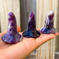 Amethyst Witch-Hat. Looking for Carved Gemstone? Shop at Magic Crystals for Beautiful Crystal Witch Caps made of genuine Fluorite, Opalite, Amethyst, Clear Quartz, Black Obsidian. Gemstone Hand Carved Wizard Magic Hat Statue Decoration, Reiki Healing Quartz Sculpture, Powwow Hat. Home Decor. Gemstone 2" - Witches Hat.