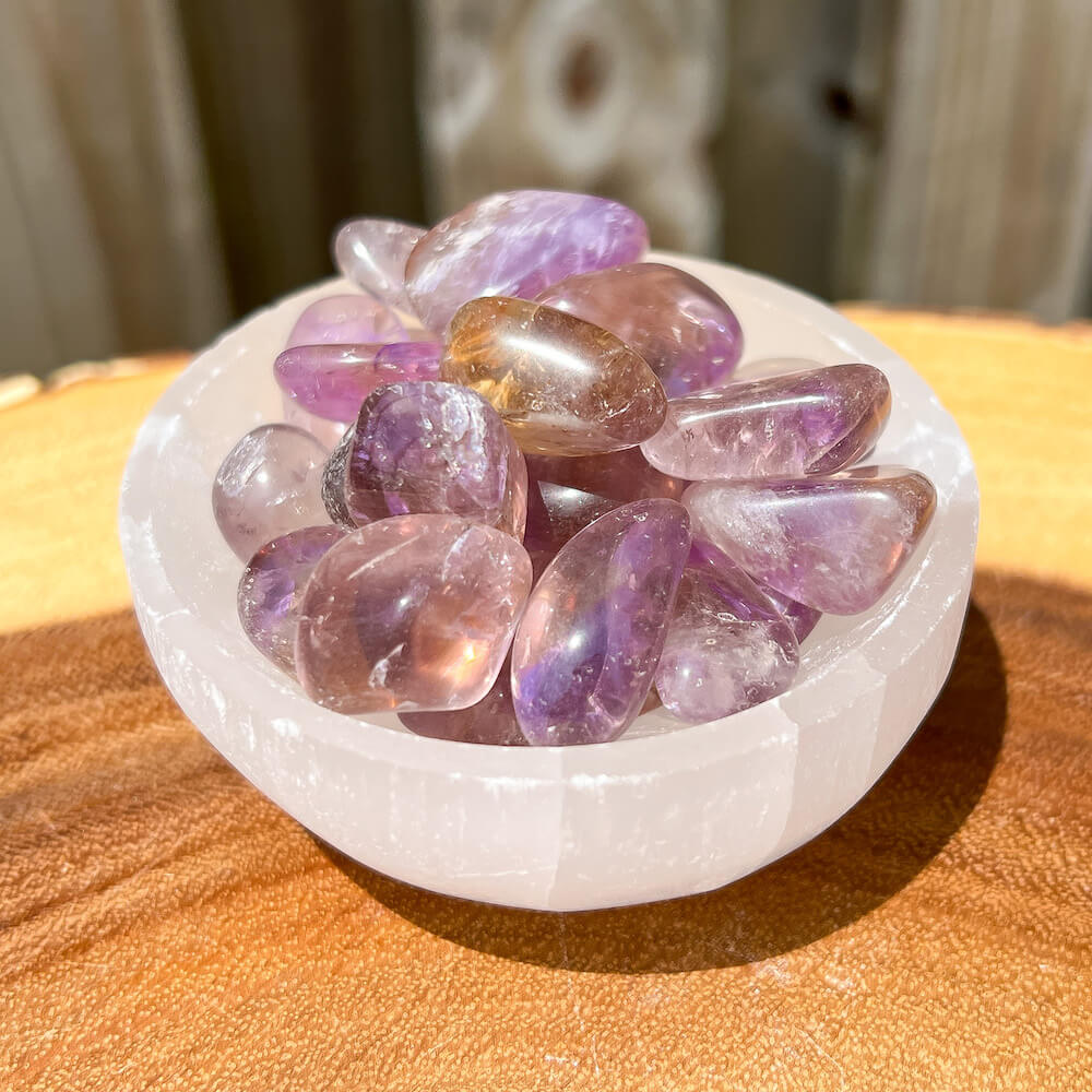 Looking for Ametrine Tumbles? Shop for Tumbled Stones, Natural Ametrine, Pocket Stones, Polished Crystals, Amethyst with Citrine at Magic Crystals. Magiccrystals.com  Rare Healing Crystal with FREE SHIPPING available. Powerful shielding from negative energy.