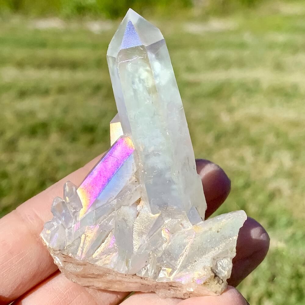 Looking for an Angel Aura Quartz Crystal Cluster 48 Healing Crystal? We have a wide variety of single points, Rainbow Quartz, Aura Crystal Cluster, Rainbow Titanium Crystal at Magic Crystals. Magiccrystals.com Aura Quartz will help you enjoy a deeper spiritual experience by connecting you to your spiritual guides. 