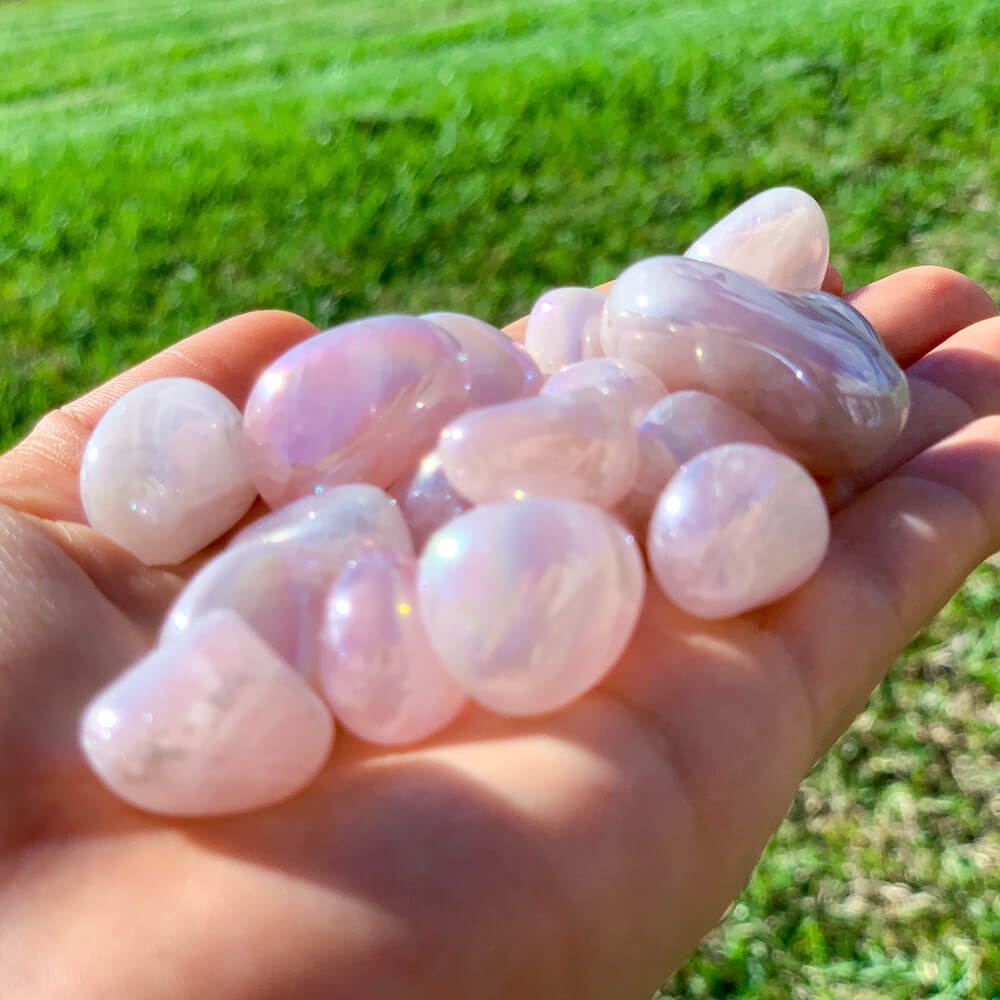 Looking for AURA ROSE QUARTZ TUMBLED STONE - Polished Rose Quartz? Magic Crystals Stones collection has polished Rose Quartz, Angelic Aura Quartz, Opal Aura Crystal, polihed pink Rose Quartz, Heart Chakra Crystals, and more. FREE SHIPPING available. Rose Quartz is the stone of universal and unconditional love.