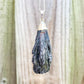 Looking for Black Kyanite Pendant with plated chain? Shop at Magic Crystals for Black Kyanite Fan Necklace. Free shipping available. Black Kyanite Fan, Rough Black Kyanite focus on Protection and Root Chakra. Bohemian Pendant is great for HIM and HER present. Mothers Day fathers day Christmas present.