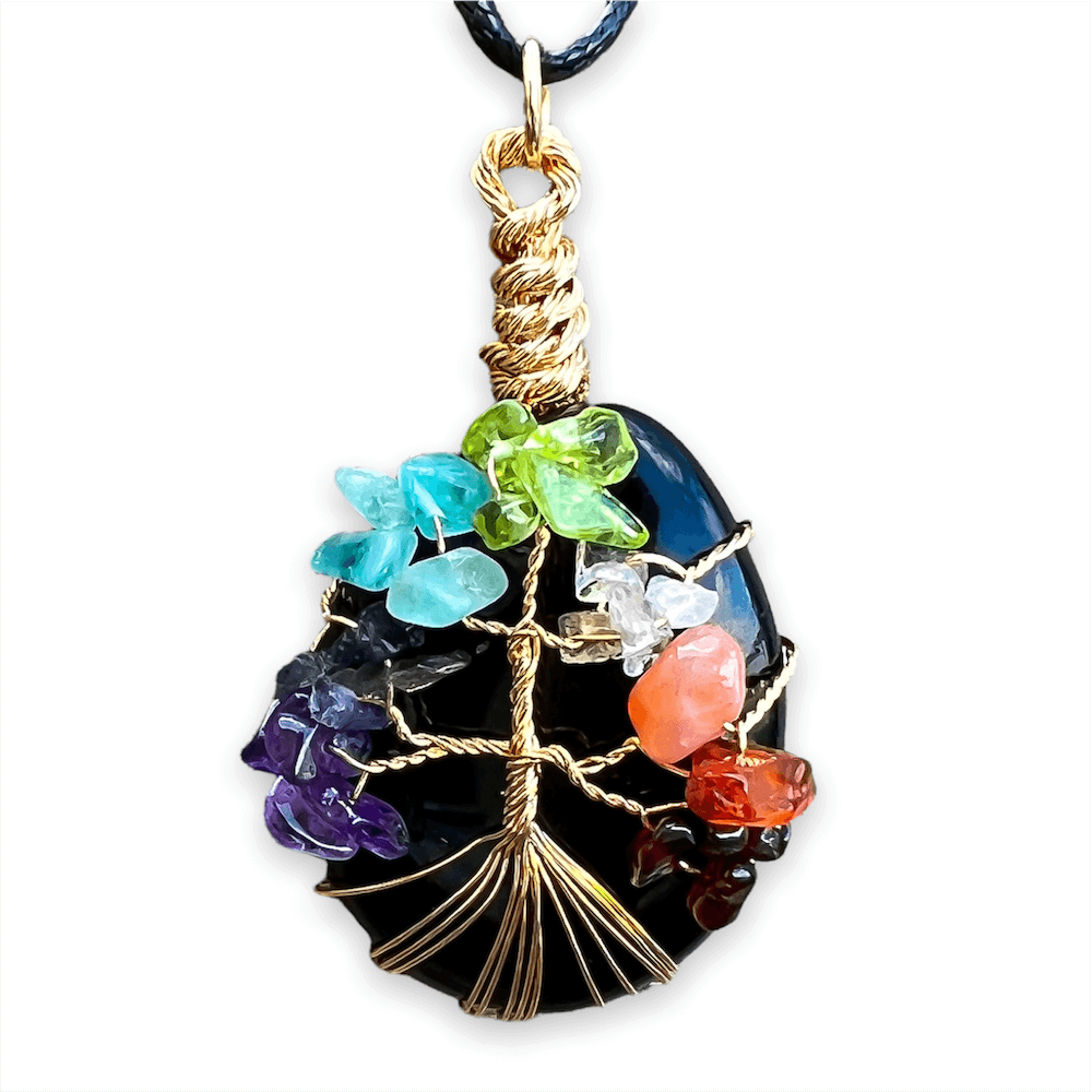    Black-Obsidia-Tree-Of-Life-Chakra-Necklace. Looking for a gift for mother/her, tree of life necklace, stone necklace, pendant? Shop at Magic Crystals for a 7 Chakra Tree Of Life Drop Necklace. 7 Chakra necklaces, and seven chakras jewelry pieces. Handmade Natural Amethyst Crystal. Amethyst Drop shape, teardrop, Protection Necklaces. 