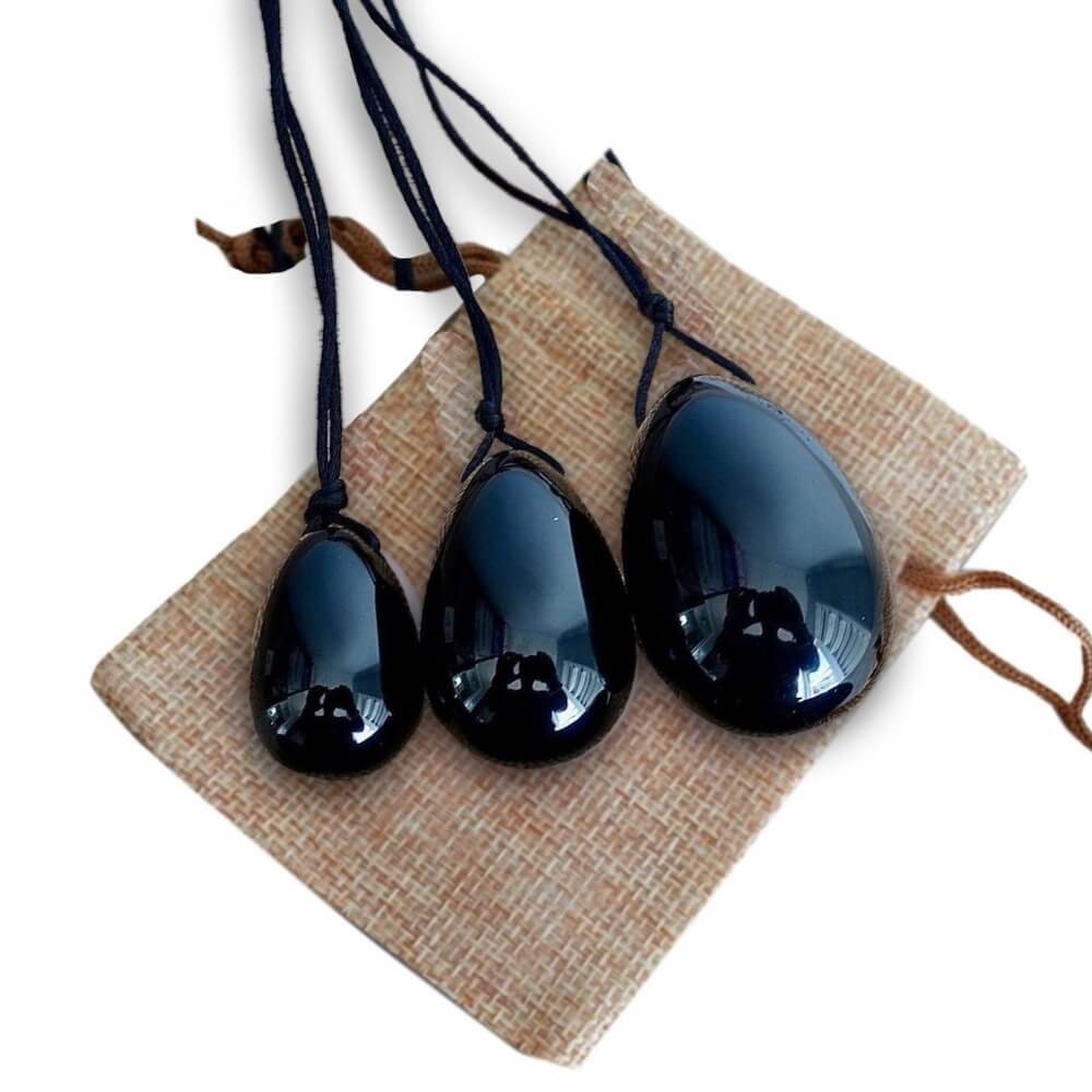 Black Onyx Yoni Eggs Set. Free Shipping Available. Buy from Magic Crystals . Yoni Eggs 3-pcs Yoni Eggs Certified  jade eggs, Drilled, with String. Yoni Eggs are highly polished semi-precious gemstones carved especially for the female Yoni (vagina). Natural Yoni Eggs Set - Yoni Eggs drilled.