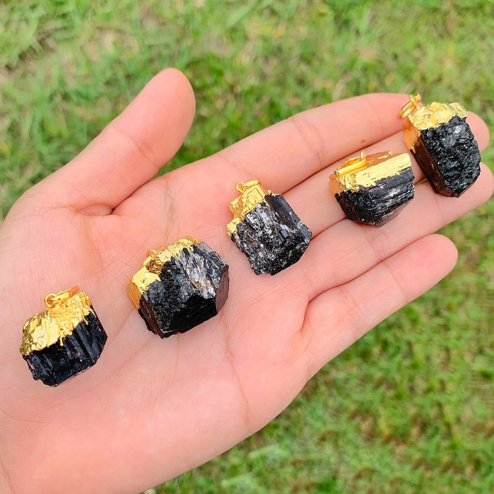 Check out our Raw Black Tourmaline Pendant. The Best Quality Handmade Healing Crystal Gemstones for Protection. This is a Great Stone to Keep you grounded and Align your Root Chakra. Black Tourmaline Also Aids in the Removal of Negative Energies Within a Person or a Space. Magic Crystal Free Shipping Available.