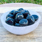 Looking for Black Obsidian? Enjoy FREE SHIPPING at Magic Crystals when you are looking for Black Obsidian TUMBLED MEDIUM - Tumbled Black Obsidian - Grounding Protection - Root Chakra - Base Chakra for Energy Healing. Black Obsidian is a very protective stone and is excellent for removing negativity.