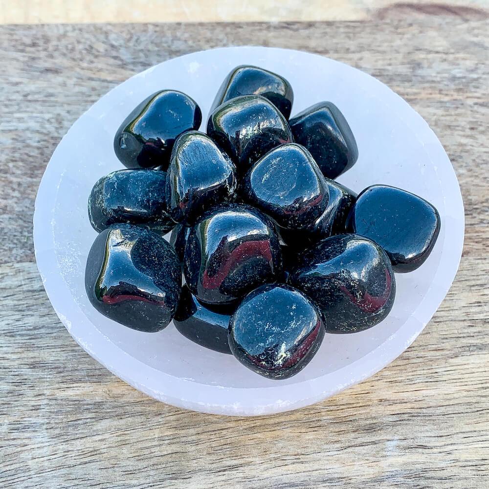 Looking for Black Obsidian? Enjoy FREE SHIPPING at Magic Crystals when you are looking for Black Obsidian TUMBLED MEDIUM - Tumbled Black Obsidian - Grounding Protection - Root Chakra - Base Chakra for Energy Healing. Black Obsidian is a very protective stone and is excellent for removing negativity.