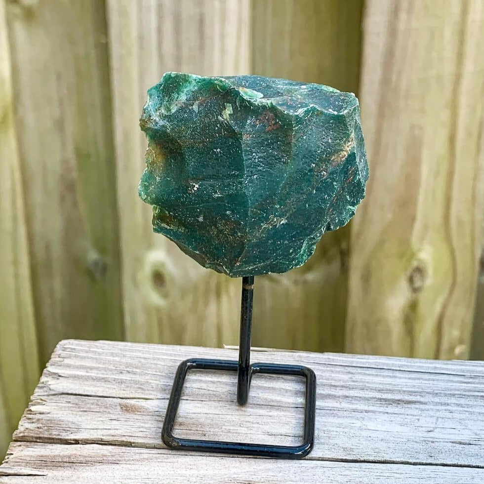 Shop from Magic Crystals One Bloodstone Rough Druzy Bloodstone Metal Stand, Bloodstone Chunk on Stand, Point on Stand Pin, Bloodstone Protect Stone, Rough Bloodstone, Raw Bloodstone! We carry a wide variety of clear quartz gemstones, Bloodstone, and quartz specimens. FREE SHIPPING AVAILABLE.