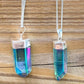 Looking for Blue Aura Points, Blue Quartz Point? Shop at Magic Crystals for a variety of Blue Aura Quartz Crystal Point Necklace - Sterling Silver Healing Gemstone Aura Quartz Necklace - Blue Aura Quartz Pendant. Raw Blue Aura  Quartz Crystal Necklace, Raw Crystal Point Pendant, Wrap Necklace for Men Women