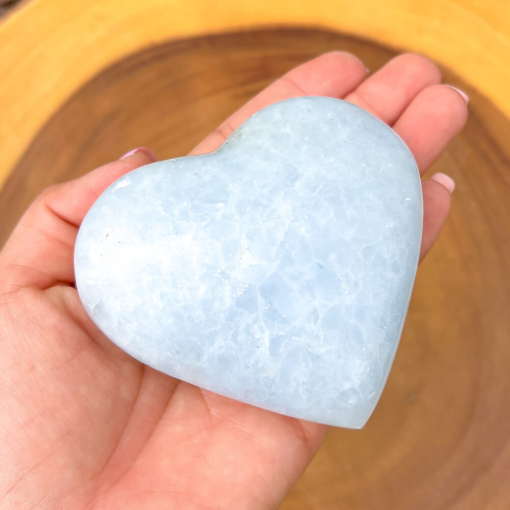Looking for a Blue Calcite Heart? Shop at Magic Crystals for Blue Calcite Polished Carved Plate, Blue Calcite Stone, Blue Calcite Point, Stone Heart with free shipping available. Natural Blue Calcite Gemstone for TRANQUILITY and HEALING. Magiccrystals.com offers the best quality gemstones. Blue-Calcite-Heart-D