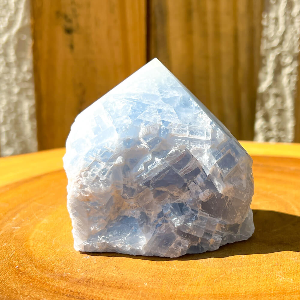 Blue Calcite Power Point - Looking for a Polished Point - Stone Points - Crystal Points - Power Point - Crystal Point Large - Crystal Point Tower - Stone Point? MagicCrystals.com has a wide variety of crystal points to power you grid!. These are used as an Alter Crystal Tower.  Magic Crystals offers free shipping! Crystal Grid Point