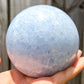 Looking for a Blue Calcite Sphere? Find a Beautiful Extra Large Blue Calcite Sphere - A at Magic Crystals for Blue Calcite Polished Carved crystal ball, Blue Calcite Stone, Blue Calcite Point, Blue Calcite Polished Ball. Blue Calcite for TRANQUILITY and HEALING. Magiccrystals.com offers the best quality gemstones.