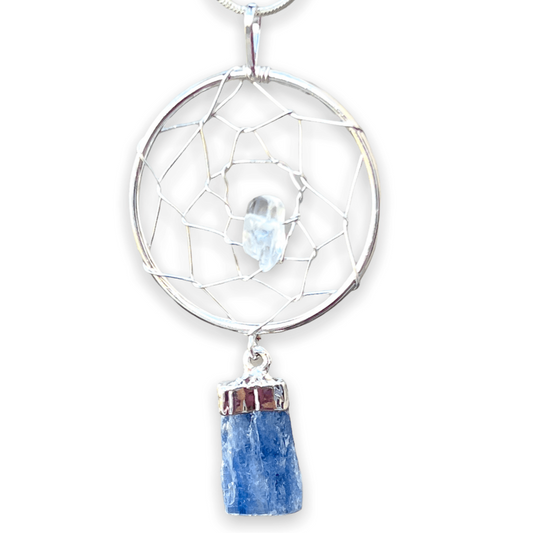 Gorgeous silver plated Blue Kyanite Dreamcatcher Silver Necklace adorned with a quartz crystal bead and a raw Blue Kyanite crystal hanging from the bottom. Shop at Magic Crystals for Blue Kyanite Jewelry, Healing Crystals, and Stones. Perfect gift for someone or to wear every day. Boho Jewelry, Communication stone