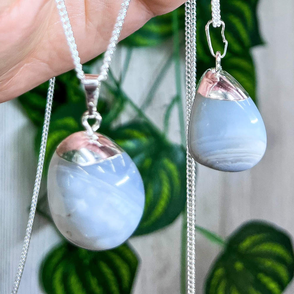 Looking for Blue Lace Agate Tumbled Pendant Necklace Jewelry? Shop at Magic Crystals for genuine blue lace agate jewelry. Bezel Pendants, Blue Lace Agate Pendant, Silver Bezel, Agate Pendants Jewelry. FREE SHIPPING AVAILABLE. Blue Lace Agate known as a healing stone, with a soft, cooling, and calming energy. 