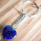 Blue Sandstone keychain. Shop at Magic Crystals for Crystal Keychain, Pet Collar Charm, Bag Accessory, natural stone, crystal on the go, keychain charm, gift for her and him. Blue Sandstone is a great for vitality. Blue Sandstone Natural Stone Keychain, Crystal Keychain, Blue Sandstone Crystal Key Holder. Blue gemstone