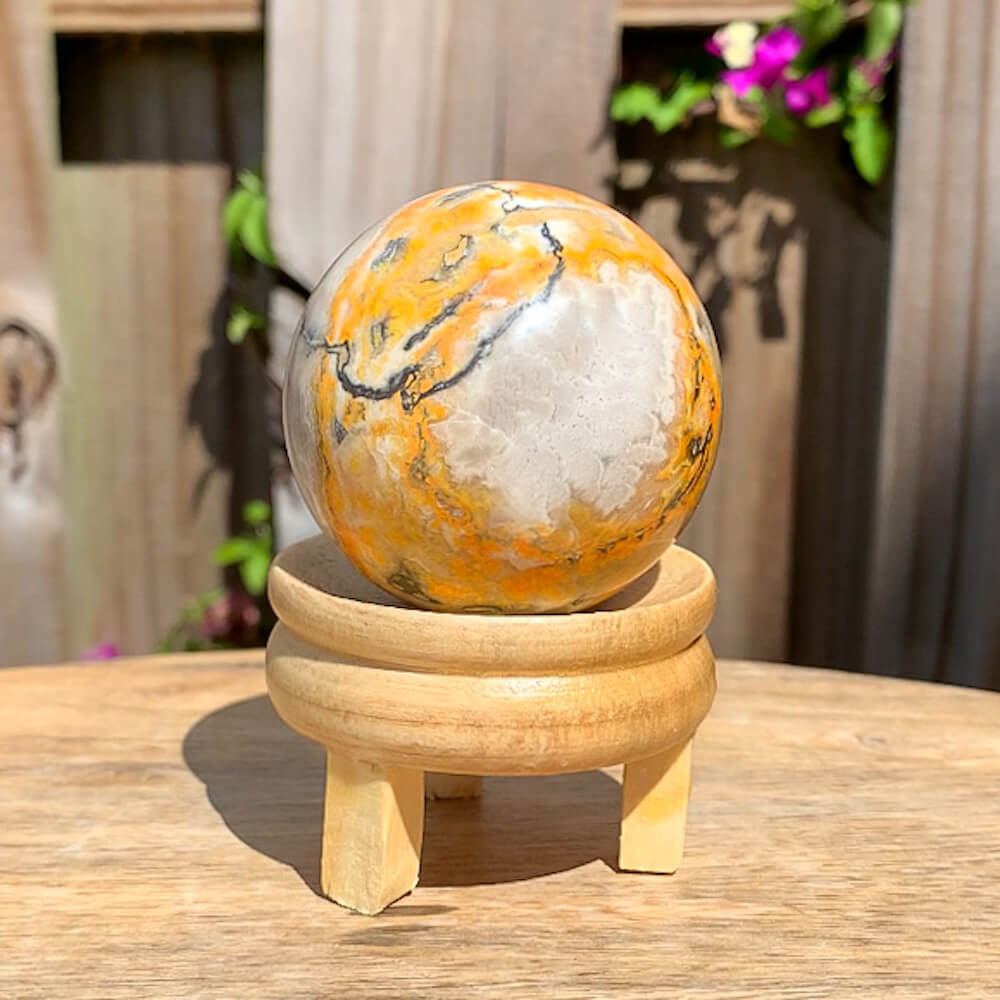 Looking for genuine gemstone spheres? bumble bee jasper? Magic Crystals carries Tumbled Bumblebee Jasper Sphere. This is one summertime Bumble Bee Jasper Sphere.  bumble bee jasper, polished jasper, bumble bee jasper sphere, tumbled stones, tumbled crystals. FREE SHIPPING available.