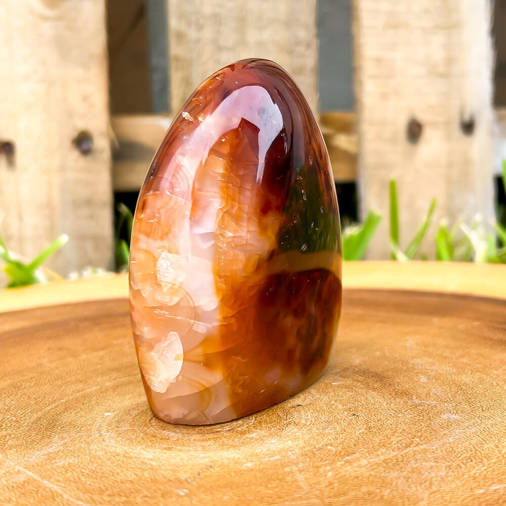 Looking for genuine and stunning Carnelian Free Form - #2 Shop at Magic Crystals for polished cut base carnelian. We only carry 'AAA' Quality Carnelian from India and Madagascar. Carnelian Crystal -  Red Crystal - Tower for reiki Healing. Free Standing Crystal, Beautiful Display Crystal.