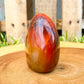 Looking for genuine and stunning Carnelian Free Form - #3 Shop at Magic Crystals for polished cut base carnelian. We only carry 'AAA' Quality Carnelian from India and Madagascar. Carnelian Crystal - Red Crystal - Tower for reiki Healing. Free Standing Crystal, Beautiful Display Crystal.