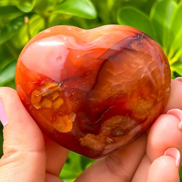 Looking for a genuine and stunning Carnelian Crystal Heart? Shop at Magic Crystals for Carnelian Heart - Orange Heart - Crystal Stone Heart. Extra-High Quality Carnelian Hearts. We only carry 'AAA' Quality Carnelian from Madagascar. Red Agate Crystal for Reiki Healing. Red Carnelian, Orange Carnelian, Authentic Crystal. Carnelian-Heart-J